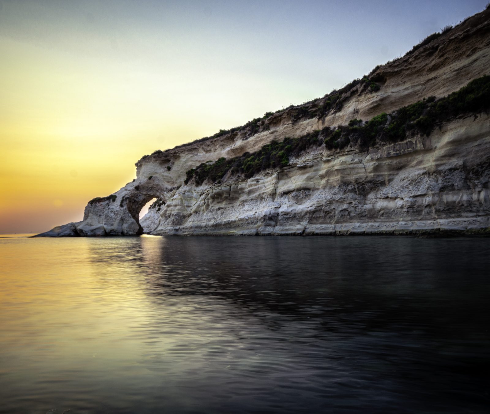 Sunrise over the coast at Munxar, Marsaskala, Malta